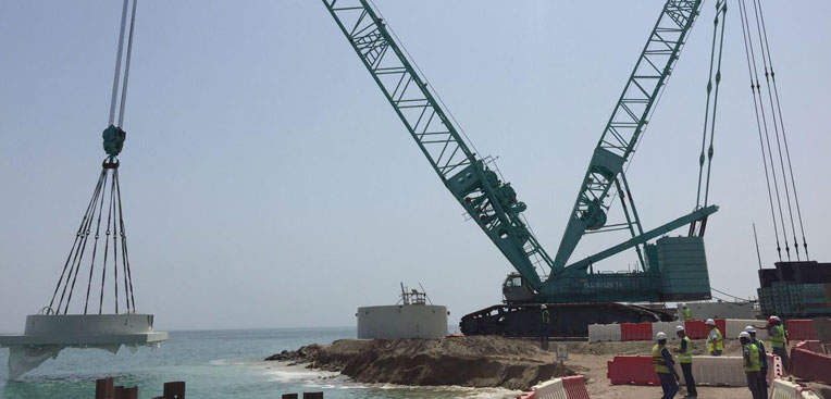 Lifting of Concrete intake tower section . Ready to installation offshore