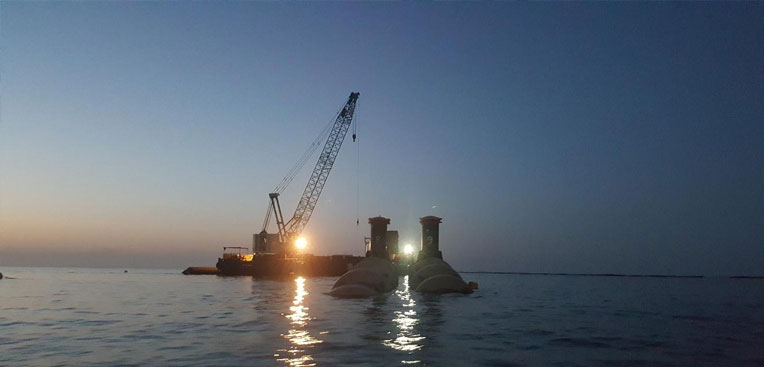Pipeline sinking at Qurayyat desalination plant Oman .